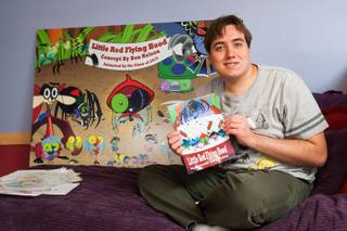 Autistic author Ben Nelson, 20, is shown with his newly published book 