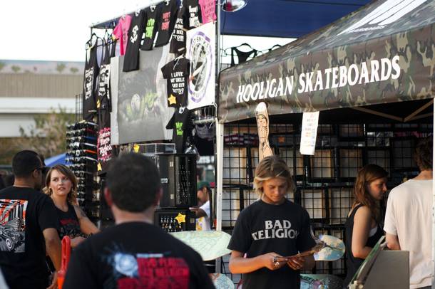Festival goers browse the vendor area at the Punk Rock Bowling & Music Festival Sunday, May 25, 2014.