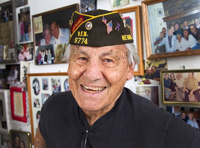 World War II veteran Gaetano "Guy" Benza poses at his home in North Las Vegas Wednesday, May 28, 2014. Benza and Davis Leonard, another local World War II veteran, will receive the French Legion d'Honneur award on Friday. The award is the highest honor France bestows on its citizens and foreign nationals.