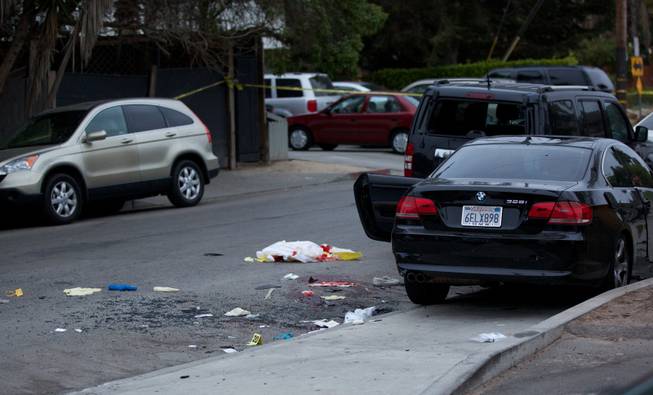Police tape marks off the scene of a drive-by shooting that left seven people dead, including the attacker, and others wounded on Friday, May 23, 2014, in Isla Vista, Calif. 
