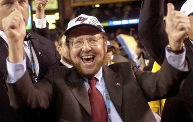 Tampa Bay Buccaneers owner Malcolm Glazer celebrates the Bucs' 48-21 victory over the Oakland Raiders in Super Bowl XXXVII on Jan. 26, 2003, in San Diego. Glazer, the self-made billionaire who owned the NFL's Tampa Bay Buccaneers and English soccer's Manchester United, has died. He was 85. The Bucs said Glazer died Wednesday, May 28, 2014.