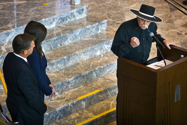 Waddie Mitchell gives a poetry reading during the unveiling ceremony of the Nevada Sesquicentennial commemorative stamp at the Smith Center on Thursday, May 29, 2014.