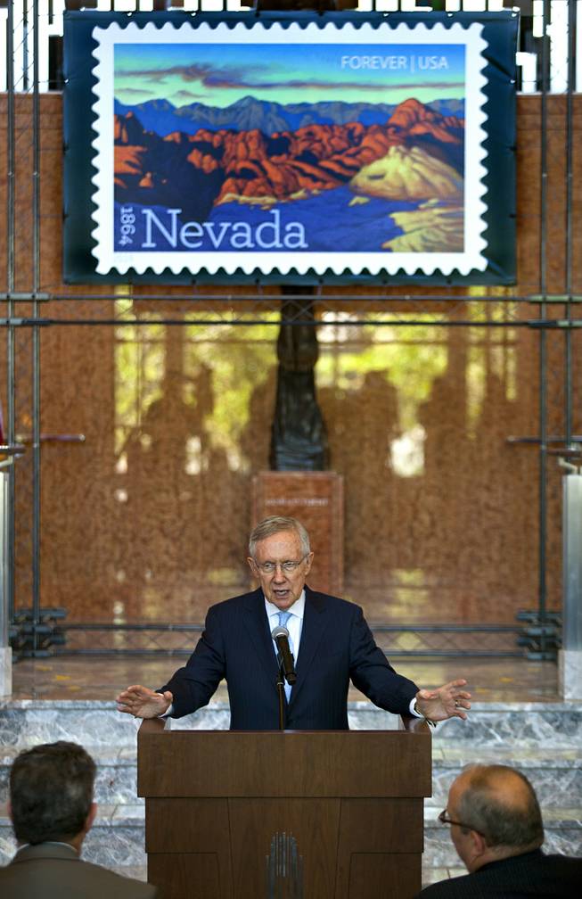 Senator and Majority Leader Harry Reid gives stamp dedication remarks during the unveiling ceremony of the Nevada Sesquicentennial commemorative stamp at the Smith Center on Thursday, May 29, 2014.