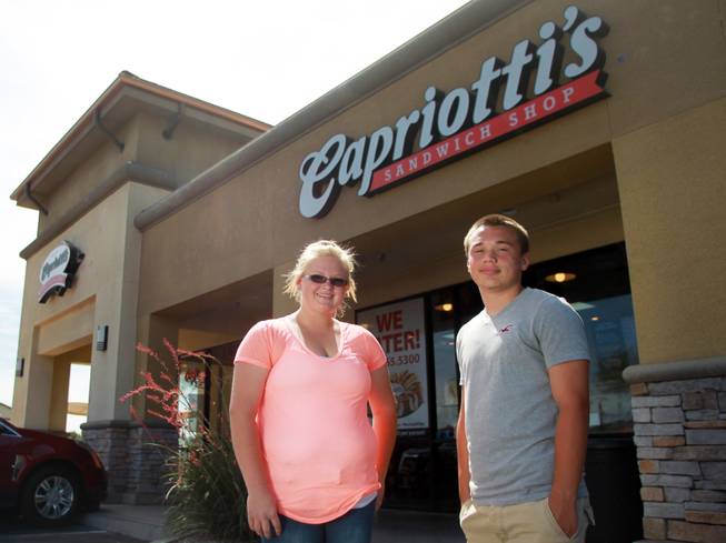 Jamilynn Bingham and Brian Bleak are seen outside a Henderson Capriotti's on Thursday, May 29, 2014. On Wednesday, the two helped corner a man suspected of grabbing a tip jar from the business and running.