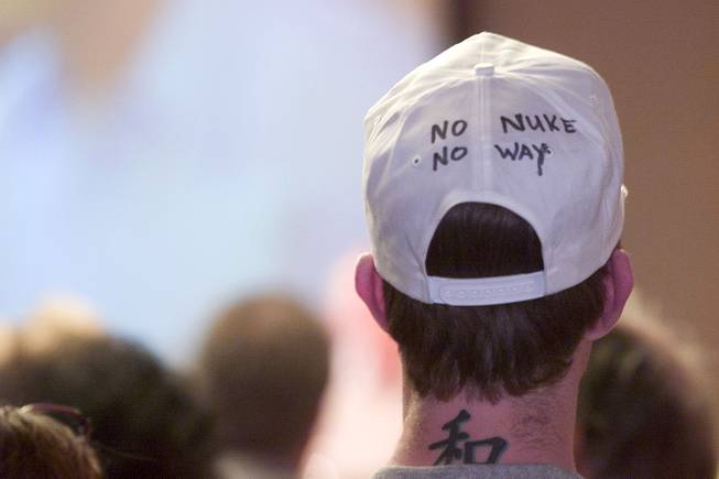 A protestor wears his sentiments on a cap during the Department of Energy's public hearing on the proposed Yucca Mountain Repository Sept. 5, 2001.