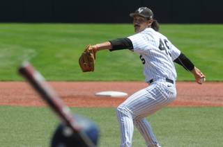 UNLV's John Richy delivers a pitch in the first inning against UC Irine at the NCAA college baseball tournament regional in Corvallis, Ore., Friday, May 30, 2014. (AP Photo/Mark Ylen)