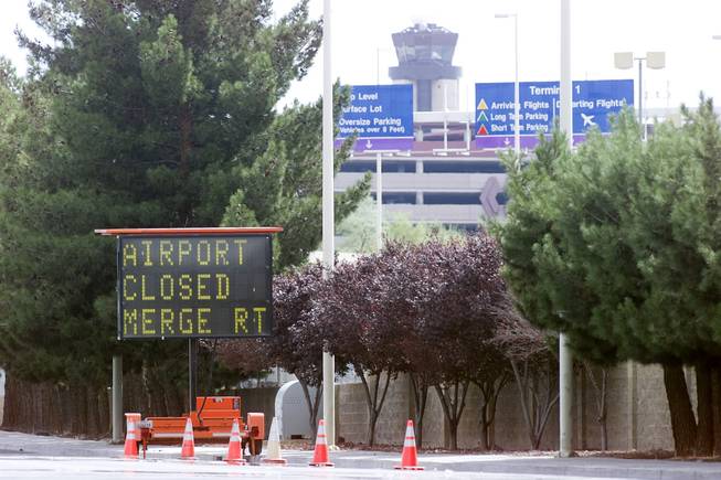 A sign indicating the closure of McCarran International Airport is seen Tuesday, Sept. 11, 2001.