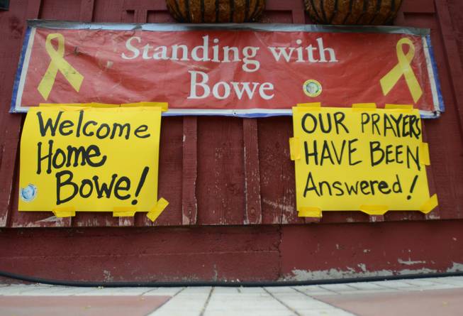 New signs hang at Zaney's coffee house in Hailey, Idaho on Saturday, May 31, 2014 after the announcement that U.S. Army Sgt. Bowe Bergdahl has been released from captivity. Bergdahl, 28, had been held prisoner by the Taliban since June 30, 2009. He was handed over to U.S. special forces by the Taliban in exchange for the release of five Afghan detainees held by the United States. (AP Photo/The Times-News, Drew Nash)