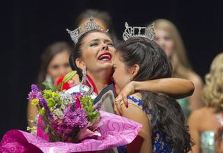 Ellie Smith and Amy Smith embrace after the sisters won the 2014 Miss Nevada and Miss Nevada’s Outstanding Teen Pageants, respectively, at the Las Vegas Academy of the Arts Theater on Sunday, June 1, 2014.