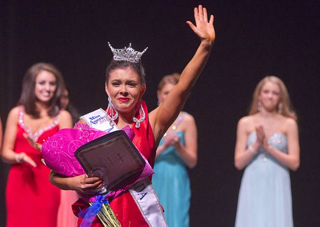 Ellie Smith of Henderson waves after being crowned 2014 Miss Nevada at the Miss Nevada and Miss Nevada Outstanding Teen Pageant at the Las Vegas Academy Theater Sunday, June 1, 2014. Her sister Amy Smith was crowned 2014 Miss Nevada Outstanding Teen.