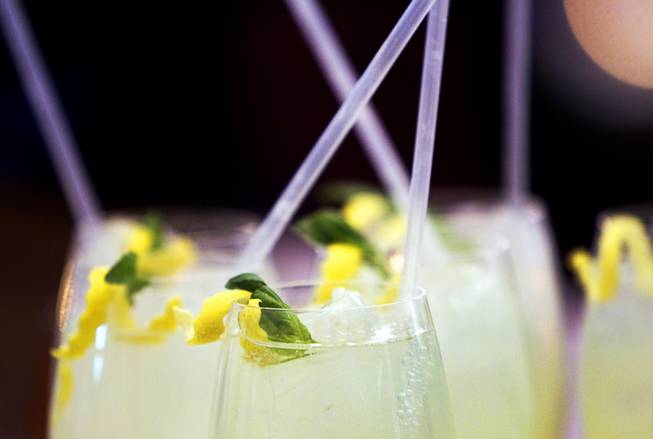 Glasses of basil lemonade are served during the VIP grand opening of Giada, the first Giada De Laurentiis restaurant, on Monday, June 2, 2014, in the Cromwell. The restaurant opens to the public Tuesday.