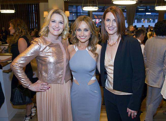 Celebrity chef Giada De Laurentiis, center, with Eileen Moore, left, president of the Cromwell, and Karie Hall, general manager, during the VIP grand opening of Giada, the first Giada De Laurentiis restaurant, on Monday, June 2, 2014, in the Cromwell. The restaurant opens to the public Tuesday.
