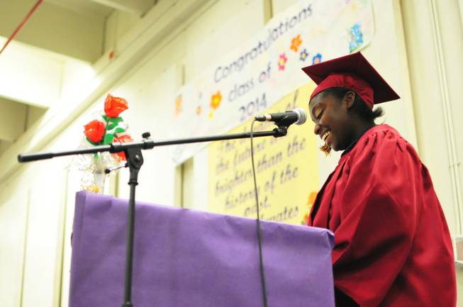 Simone Taylor, 25, smiles as she gives her valedictorian speech during a Clark County School District graduation ceremony at the Florence McClure Women's Correctional Center on Tuesday, June 3, 2014. More than 70 inmates at Nevada's sole women's prison earned their high school diplomas, GEDs and vocational certificates this year from the district's adult education program.