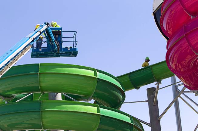 Workers are shown on the "Breaker 1-9" water slide at the Cowabunga Bay water park in Henderson Thursday, June 5, 2014. Developers announced that the water park will open July 4. The park includes a 32,000-square-foot wave pool, water slides and a 1,200-foot-long lazy river.