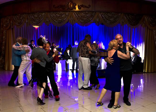 Dancers enjoy music by "Big Band is Back with Kat Ray" at the new Viva Las Vegas Event Center which is a vintage, Vegas-style venue on Friday, June 6, 2014.