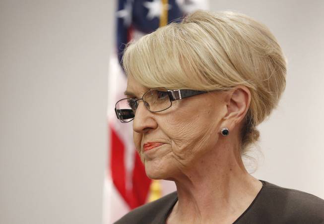FILE-- In this Feb. 26, 2014, file photo, Arizona Gov. Jan Brewer appears at a press conference at the Arizona Capitol in Phoenix. Irate about the federal government sending from Texas to Arizona immigrants who are in the country illegally, Arizona officials are rushing federal supplies to a holding center in the southern part of the state that's housing migrant children. Gov. Jan Brewer's spokesman, Andrew Wilder, said Friday, June 6, that conditions at the holding center are so dire that federal officials have asked the state to immediately ship the medical supplies to the center in Nogales. (AP Photo/Ross D. Franklin, file)