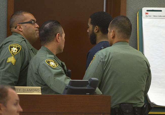 Prentice Marshall leaves the courtroom in at the Regional Justice Center Monday, June 9, 2014. Marshall is one of the men accused of killing Las Vegas police officer Trevor Nettleton in 2009.