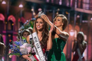 2014 Miss Nevada USA Nia Sanchez is crowned 2014 Miss USA by 2013 Miss USA Erin Brady of Connecticut at the 2014 Miss USA Pageant at Baton Rouge River Center on Sunday, June 8, 2014, in Baton Rouge, La.