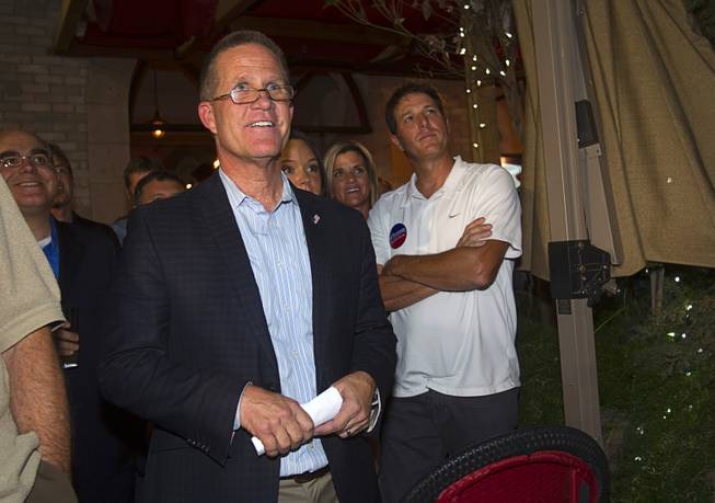 Mark Hutchison, Republican candidate for Lt. Governor, prepares to take the stage during an primary election night party at Dom Demarco's Pizzeria Tuesday, June 10, 2014.
