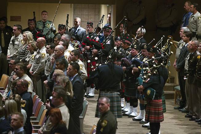 Members of the Las Vegas Firefighters Pipe & Drum Band and Honor Guard perform during services for Metro Police officer Igor Soldo at Canyon Ridge Church Thursday, June 12, 2014. Soldo and Metro Police Officer Alyn Beck where ambushed and killed by Jerad and Amanda Miller while eating lunch on Sunday, June 8.