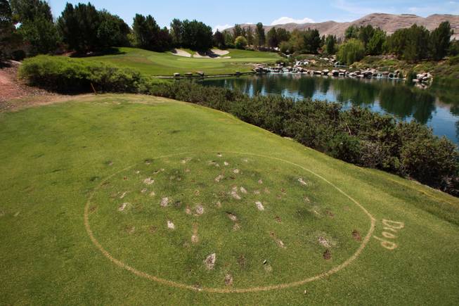 An oft used ball drop area is seen on the par 3 17th hole at Southern Highlands Golf Club May 22, 2014.