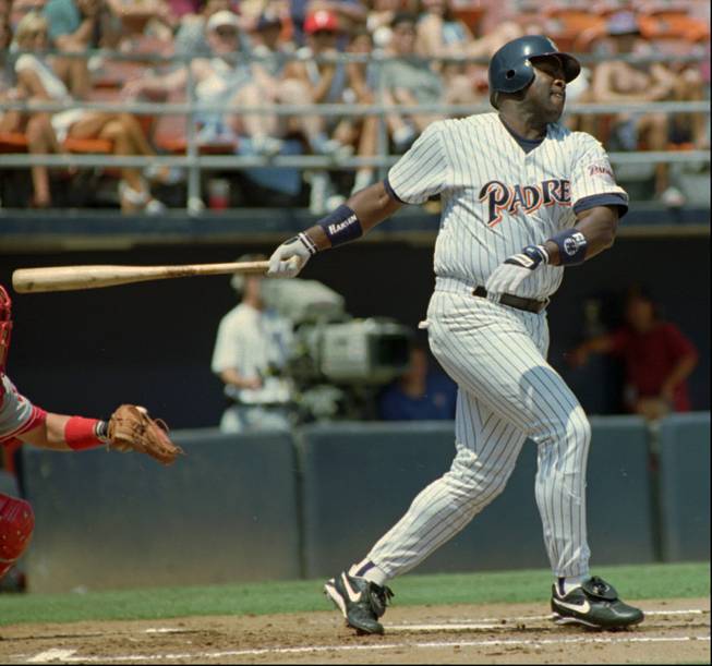 San Diego Padres' right fielder Tony Gwynn connects for a base hit against the Philadelphia Phillies Saturday, Sept. 2, 1995 in San Diego. Gwynn finished the 1995 season with a batting average of .368, winning his sixth National League batting title.