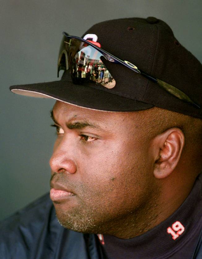 San Diego Padres' Tony Gwynn watches his teammates from the dugout, during a practice day at Qualcomm Stadium in San Diego, Calif., Friday, Oct. 9, 1998. The Padres lead the Braves 2-0 in the National League Championship Series and will play the Braves Saturday in game 3.  