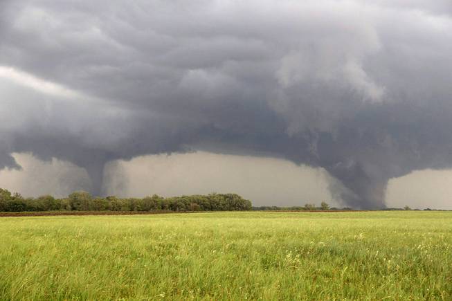 Two tornados approach Pilger, Neb., Monday June 16, 2014. The National Weather Service said at least two twisters touched down within roughly a mile of each other Monday in northeast Nebraska. 