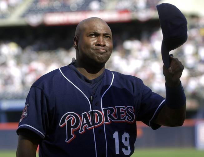 In this Oct. 7, 2001, file photo, San Diego Padres' Tony Gwynn fights back tears as he acknowledges the standing ovation prior to the Padres' game against the Colorado Rockies, the final game of his career, in San Diego. The Baseball Hall of Fame said Gwynn died of cancer on Monday, June 16, 2014. He was 54.
