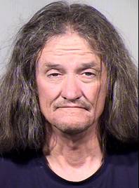 Gary Moran is seen in this June 16, 2014, booking photo provided by the Maricopa County Sheriffs Office. Moran is being held on suspicion of first-degree murder, burglary and armed robbery, among others charges in the killing of a Roman Catholic priest and the beating of a second priest at a downtown Phoenix church.