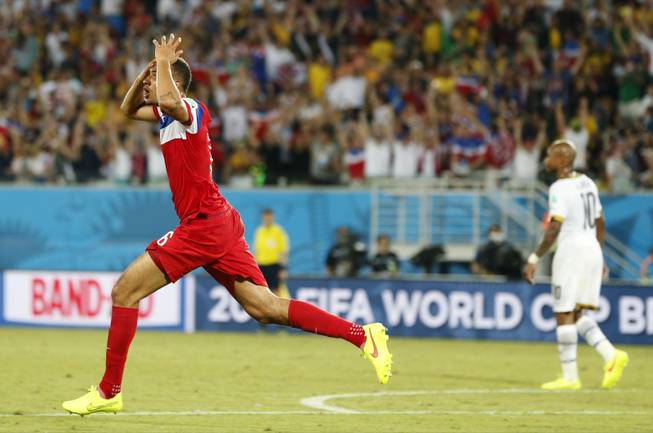 United States' John Brooks reacts after scoring his side's second goal during the group G World Cup soccer match between Ghana and the United States at the Arena das Dunas in Natal, Brazil, Monday, June 16, 2014.