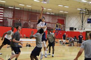 Bishop Gorman High senior center Chase Jeter attempts a shot while others, including Gorman teammate Stephen Zimmerman, look on during Team USA U18 training camp in mid-June 2014 in Colorado Springs, Colo.