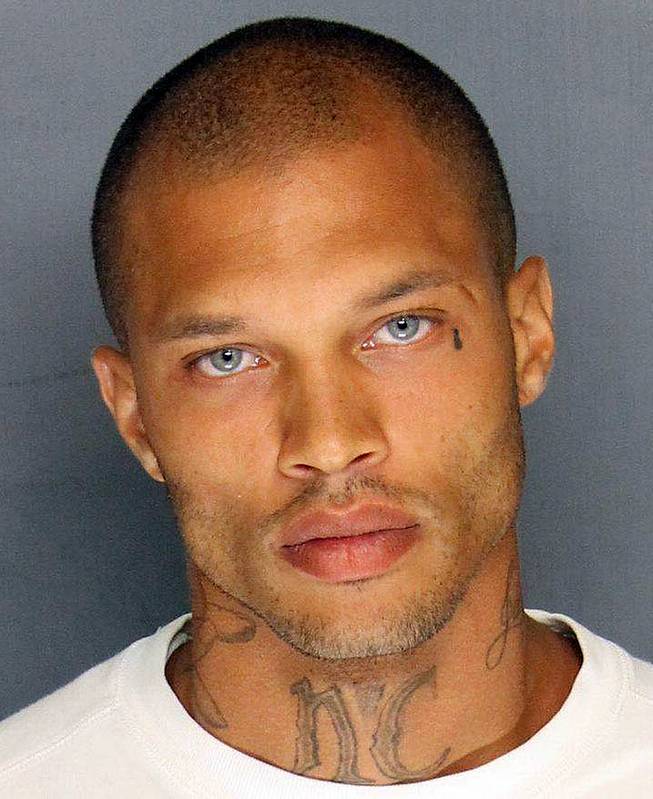 In this Wednesday, June 18, 2014, booking photo released by the Stockton Police Department is Jeremy Meeks. Meeks, 30, was one of four men arrested Wednesday in raids in Stockton, Calif.. On Thursday, his mugshot had more than 20,000 likes, nearly 6,000 comments, and had been shared more than 1,400 times on Facebook. 