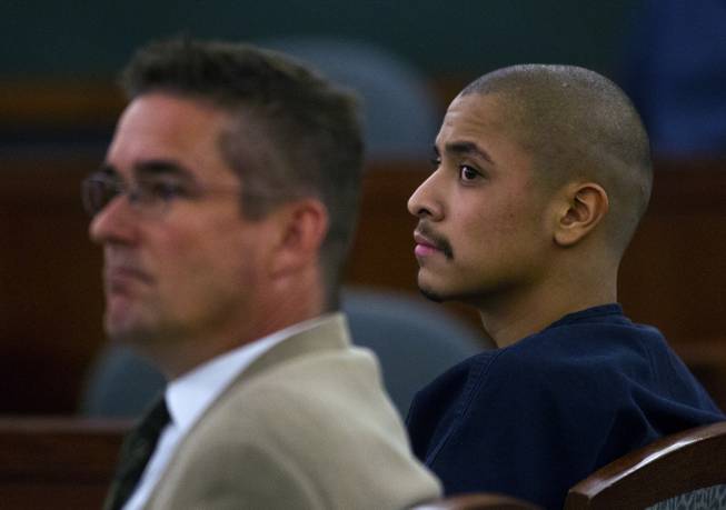 Julio Renteria with his lawyer Ronald Colquitt during his preliminary hearing at the Justice Center with Adrian McClintock on Friday, June 20, 2014. The two are suspects in a Boulder Highway carjacking gone awry that ended in Dylan Joshua Salazar's fatal shooting.