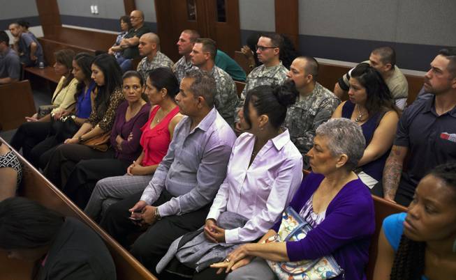 Attendees in support of Dylan Joshua Salazar listen during the preliminary hearing for Julio Renteria and Adrian McClintock at the Justice Center on Friday, June 20, 2014.
