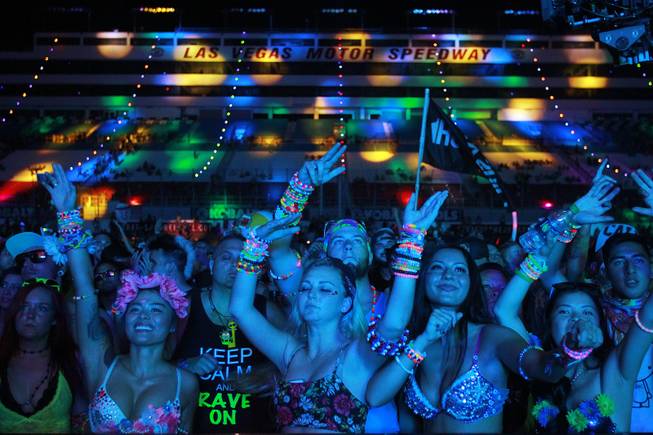 Attendees dance to the sounds of Justin Martin during the first night of the Electric Daisy Carnival early Saturday, June 21, 2014, at Las Vegas Motor Speedway.