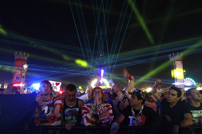 Attendees listen to a set by Lady Faith during the first night of the Electric Daisy Carnival Saturday, June 21, 2014 at the Las Vegas Motor Speedway.
