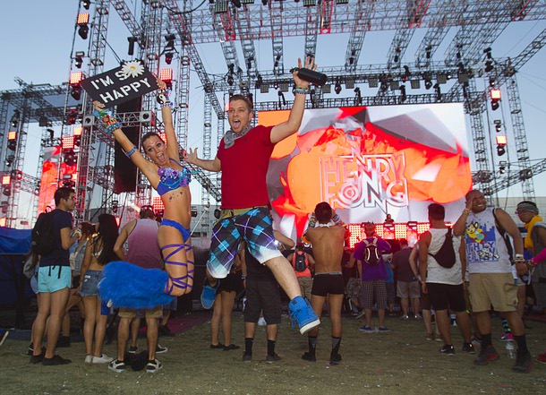 Morgan Bonsall, left, Cannon Fox of Philadelphia jump for a photo during the final day of the 2014 Electric Daisy Carnival (EDC) at the Las Vegas Motor Speedway Sunday, June 22, 2014.