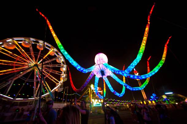 A neon octopus makes it's way around the grounds during night 2 of EDC, Saturday June 21, 2014 at the Las Vegas Motor Speedway.