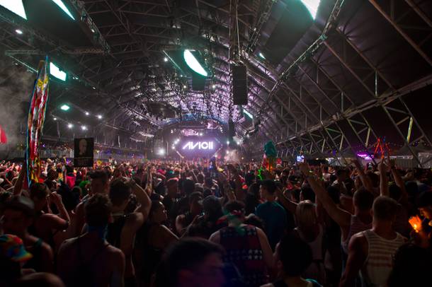 Attendees dance to the music of AVICII during night 2 of EDC, Saturday June 21, 2014 at the Las Vegas Motor Speedway.