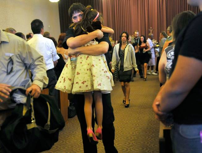 Family members of Joseph Wilcox exit the chapel after a memorial service at Palm Downtown Mortuary and Cemetery on Sunday, June 22, 2014. Wilcox, 31, was killed trying to stop Jerad and Amanda Miller in the midst of their shooting spree at an east valley Walmart store on June 8.
