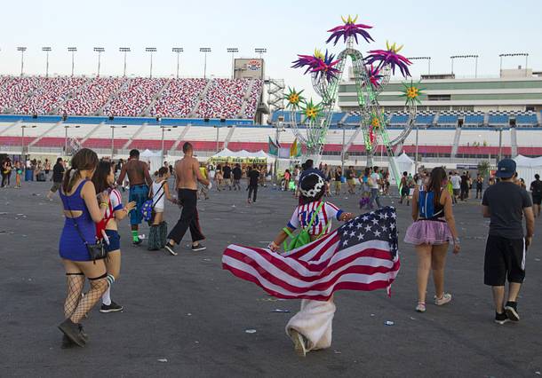 As the sun rises, fans head for the exits after the final night of the 2014 Electric Daisy Carnival (EDC) at the Las Vegas Motor Speedway Sunday, June 22, 2014.