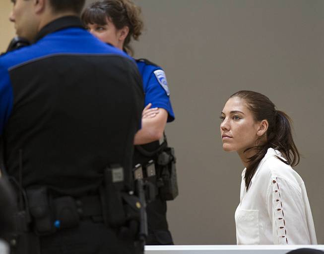 U.S. women's soccer team goalkeeper Hope Solo appears in Kirkland Municipal Court on Monday, June 23, 2014, in connection with her domestic violence arrest at her sister's home in Kirkland, Wash. 
