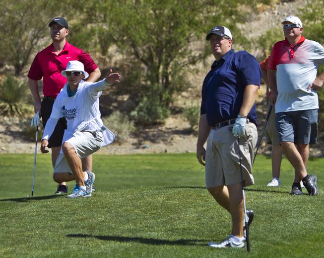 Golfers enjoy a round as HELP of Southern Nevada hosts its 20th Annual Golfers Roundup at Cascata Golf Course in Boulder City on Tuesday, June 24, 2014.