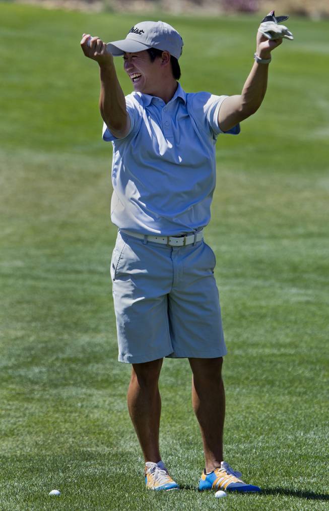 Dan Lai warms up for a ball toss as HELP of Southern Nevada hosts its 20th Annual Golfers Roundup at Cascata Golf Course in Boulder City on Tuesday, June 24, 2014.