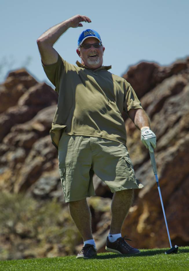Michael Rubino celebrates after sinking a great putt as HELP of Southern Nevada hosts its 20th Annual Golfers Roundup at Cascata Golf Course in Boulder City on Tuesday, June 24, 2014.