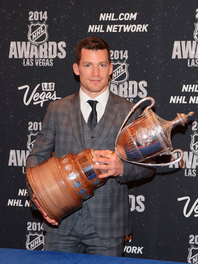 Andrew Ference of the Edmonton Oilers with the King Clancy Memorial Trophy at the 2014 NHL Awards in Encore Theater on Tuesday, June 24, 2014, at Wynn Las Vegas.