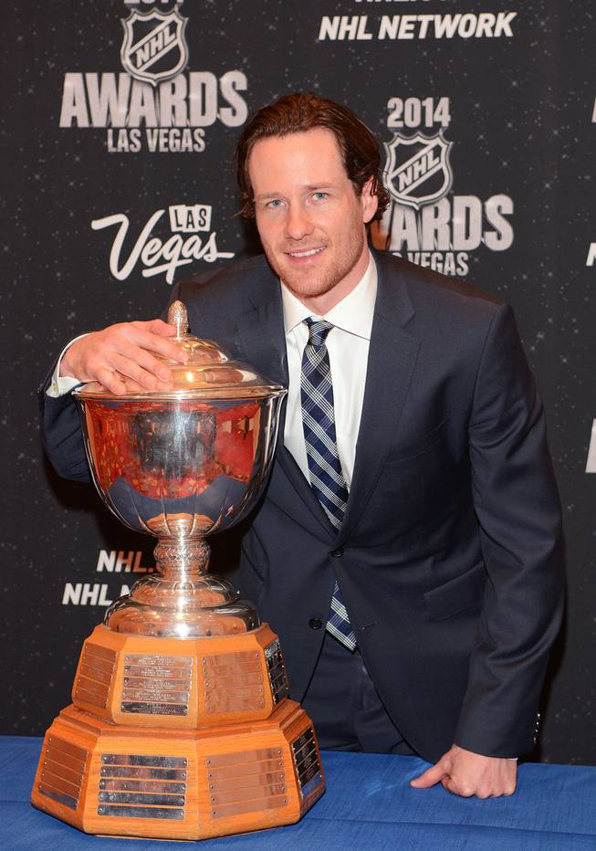 Duncan Keith of the Chicago Blackhawks with the Jack Norris Memorial Trophy at the 2014 NHL Awards in Encore Theater on Tuesday, June 24, 2014, at Wynn Las Vegas.