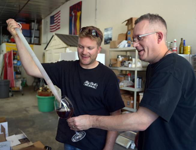 Veteran Josh Laine, co-owner of Uncle Sam&apos;s Misguided Brewery, pours a sampling of Miracle Black Ale for fellow Marine Corps veteran Andy Kulakowski on Memorial Day in Livermore, Calif., on Monday, May 26, 2014. Free tastings were part of the day&apos;s event for all veterans.