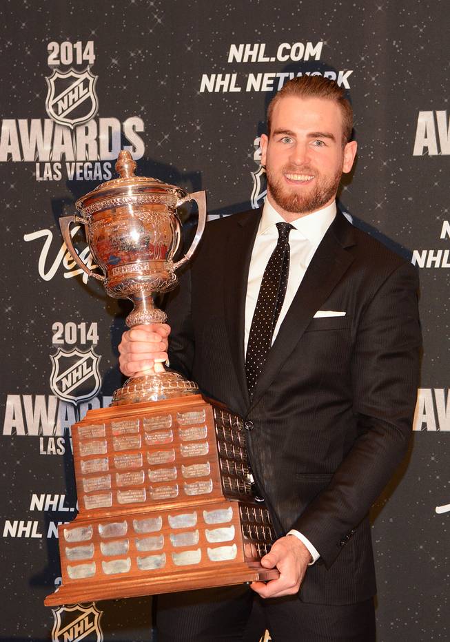 Ryan O'Reilly of the Colorado Avalanche with the Lady Byng Memorial Trophy at the 2014 NHL Awards in Encore Theater on Tuesday, June 24, 2014, at Wynn Las Vegas.